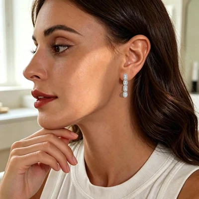 Oval and Emerald-Cut Drop Earrings by Gemsme
