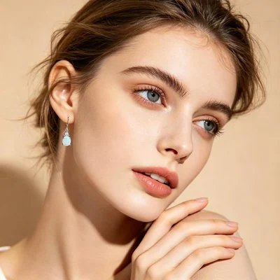 Oval Created Opal Drop Earrings by Gemsme, 7*9mm · Oval Created Opal White Gold Plated