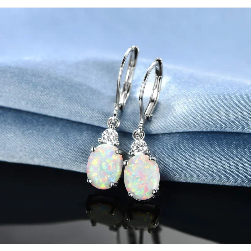 Oval Created Opal Drop Earrings by Gemsme, 7*9mm · Oval Created Opal White Gold Plated